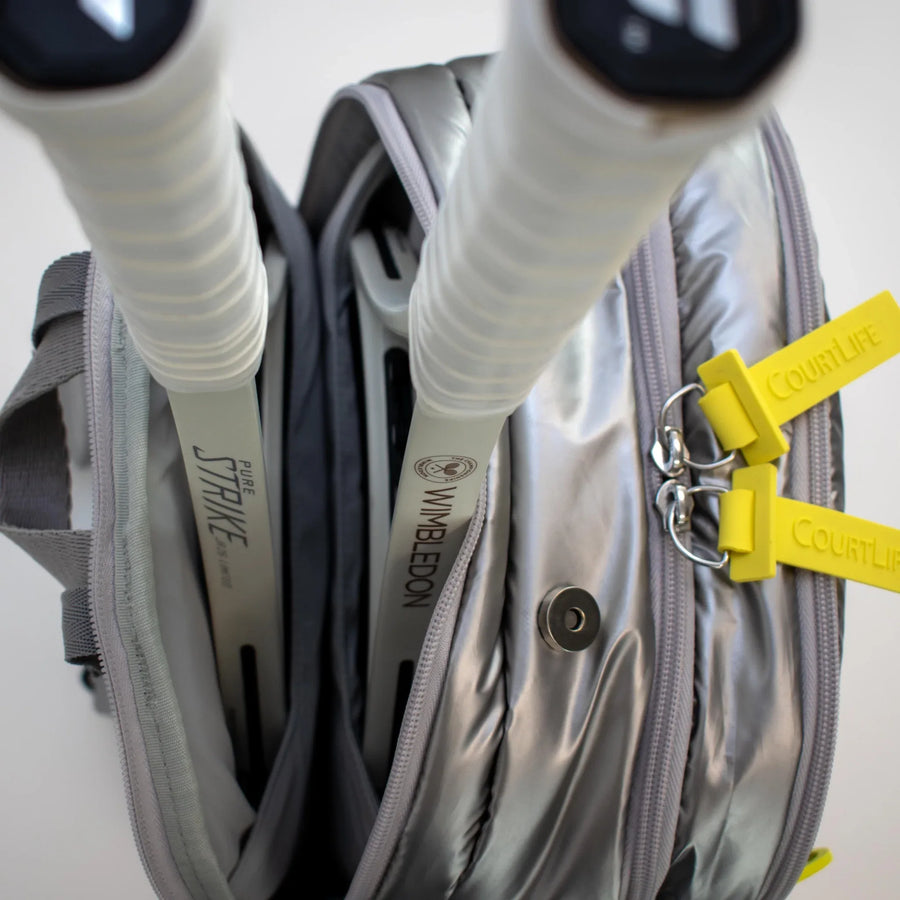 Padded interior racquet pocket